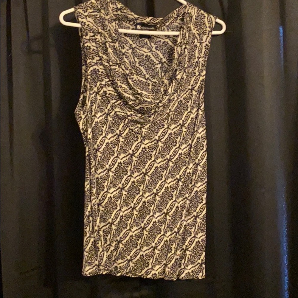 Tan and black printed top.